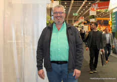 Johan van Erven (A1 Group) naast het hem zo welbekende schermdoek